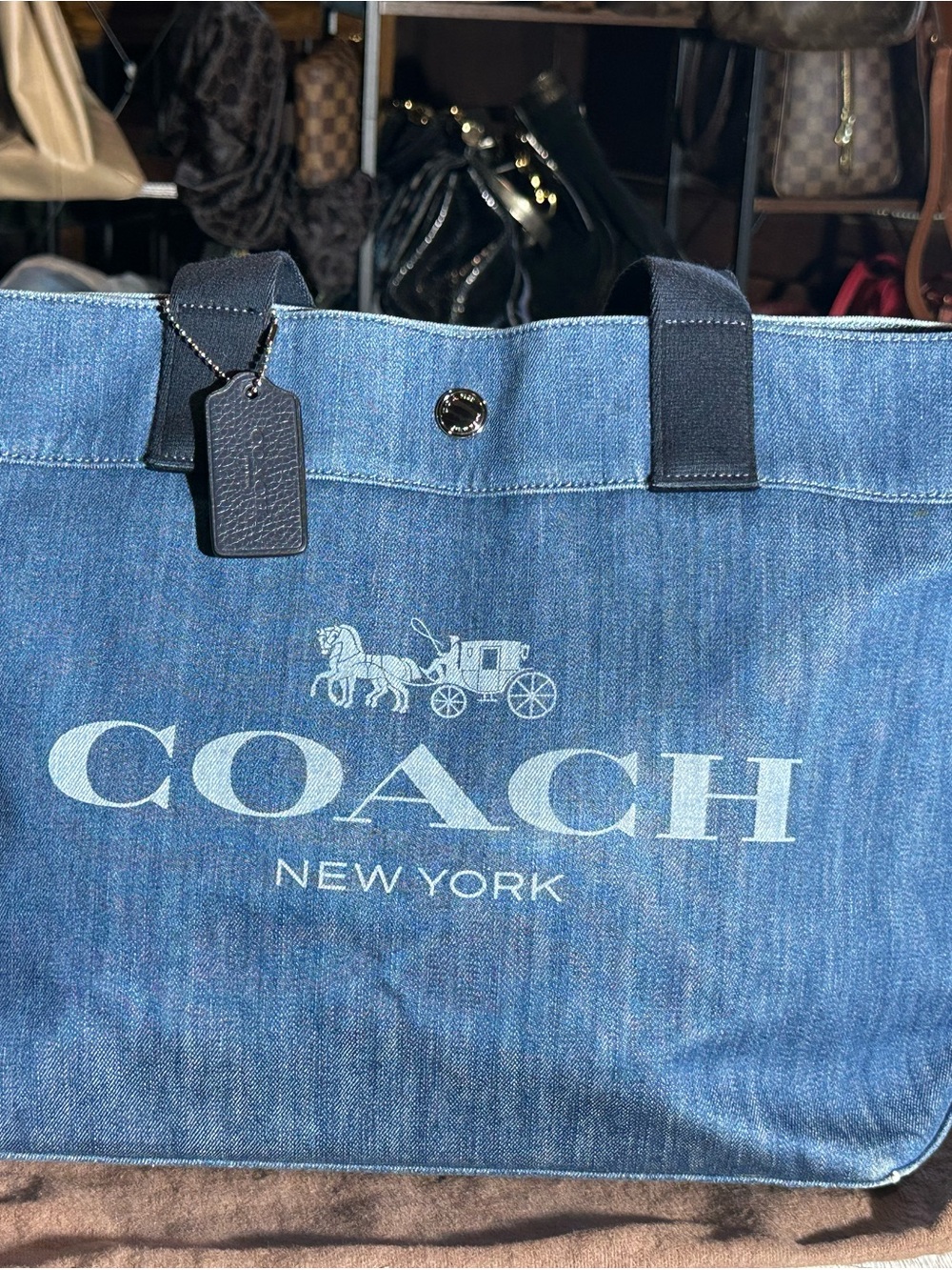 Coach Denim Logo Tote in Blue with Navy Trim and Beautiful Floral Interior